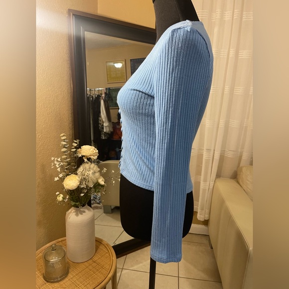 Reformation Gellar Button Front Long
Sleeve Ribbed Knit Top Parisian Blue. - Picture 9 of 15